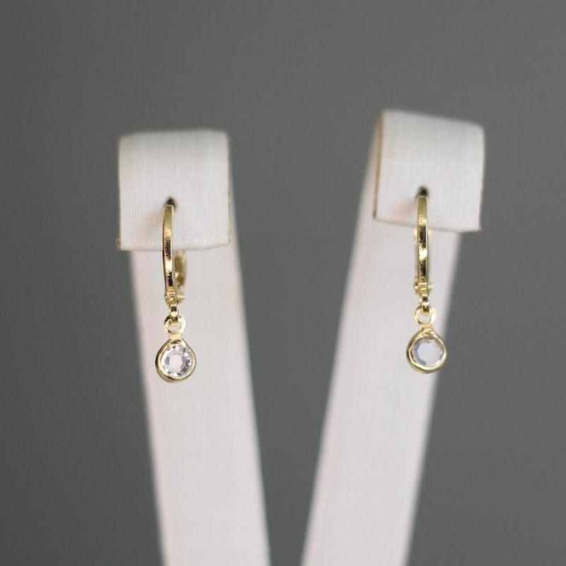 Brinco argolinha articulada com zirconia cristal